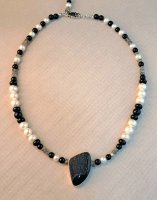 Black dressing with Labradite, freshwater pearls and onyx