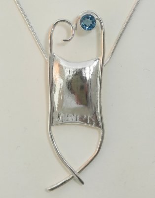 Kathleen Tackabury  - Mermaids Purse with Blue Topaz